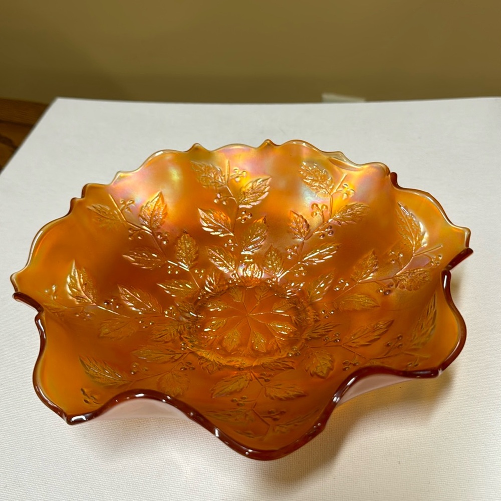 Sold
Carnival Glass Holly And Berries Marigold Ruffled Candy Bowl 9” Diameter